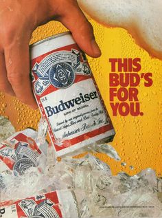 an advertisement for budweiser beer is shown in the advertiser's hand