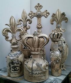 an assortment of chanel perfume bottles on display