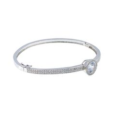 Bezel-set crystals lend glamorous sparkle to a super-shiny bangle that's perfect for stacking with other bracelets for a trendy, customized look. Inner diameter: 2.36" (6 cm) White gold plated Fold-over clasp closure Stackable Classic Cubic Zirconia Bangle Bracelet, Crystal Bangle Bracelet With Sparkling Stones, Elegant Round Bracelets With Bling, Dazzling Bangle Bracelet With Sparkling Stones, Elegant Metal Bangle With Bling, Cubic Zirconia Anniversary Cuff Bracelet, Round Cubic Zirconia Cuff Bracelet For Anniversary, Anniversary Cubic Zirconia Cuff Bracelet, White Gold Bangle Bracelet With Sparkling Stones