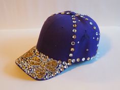 This a fun, grab and go women's baseball cap for those who are partial to a little bit of bling.  This cap can be worn almost anywhere. On days out, meeting up with friends, shopping trips, parties, festivals, holidays etc. This cap is made from 100% polyester, making it durable, breathable and resistant to water and abrasions.  This cap comes in one size with an adjustable Velcro cloth rip strap to help maintain the perfect fit. This product is Handmade. I only make products that I too, would be happy to wear.  * Recommend: Hand Wash and Hang up to Air Dry. Friends Shopping, Womens Baseball Cap, Days Out, Clear Rhinestones, Trucker Cap, Crystal Clear, Baseball Cap, Caps Hats, Accessories Hats