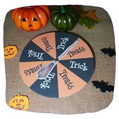 a wheel of fortune with pumpkins and jack - o'- lanterns