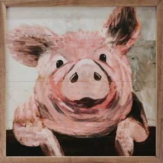 a painting of a pig is hanging on the wall