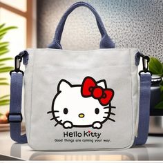 Brand New Hello Kitty Canvas Bag, Magnetic Button Fisure, Adjustable Strap. Casual Bags With Cute Design For Daily Use, Casual Bags For Daily Use With Cute Design, White Shoulder Bag With Cute Design For Daily Use, White Shoulder Bag For Daily Use With Cute Design, Trendy Hello Kitty School Bag, Cute Hello Kitty Print School Shoulder Bag, Casual Shoulder Bag With Cute Design For Everyday, Cute Cat Design Shoulder Bag For Daily Use, Trendy Hello Kitty Rectangular Shoulder Bag