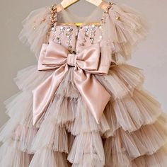 Prepare to shine in this Sequin Princess Dress Cake Dress with a silk Ribbon Bow in Beige Pink. The dress boasts a gorgeous beige-blush pink hue, embellished with shimmering sequins.Ideal for any festive event, it will make your little one feel like royalty. This dress embodies the ultimate blend of sophistication and allure, making it the perfect choice for flower girls and special occasions. Princess Dress Cake, Crinoline Skirt, Cake Dress, Vestidos Color Rosa, Girls Long Dresses, Puffy Dresses, Dress Cake, Tulle Tutu, Girl Princess Dress