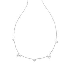 Timeless, dainty, and with the perfect touch of sparkle, the Iris White Strand Necklace has it all. Featuring petite crystals and miniature iterations of the iconic Kendra Scott medallion, this necklace will become your next go-to style. Designer, founder, and philanthropist Kendra Scott started her company in 2002, just three months after her first son was born. Her commitment to innovation, quality, customer service, and detail has taken her from a small startup to a billion-dollar brand. Kend Silver Diamond Charm Necklace With Delicate Chain, Elegant Silver Charm Necklaces With Diamond Accents, Elegant Silver Charm Necklace With Diamond Accents, Dainty Silver Charm Necklace With Diamond Accents, Simple Necklace Everyday Kendra Scott, Dainty Sterling Silver Necklace With Hallmark, Kendra Scott Necklace Silver Blue, Kendra Scott Silver Necklace, Kendra Scott Elisa Necklace Silver