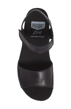 A leather-wrapped platform raises this sandal that offers total comfort with a contoured footbed that targets pressure points to relieve tension and stress. 1 1/2" heel; 1/2"platform (size 39) Adjustable hook-and-loop strap Zen footbed massages pressure points as you walk to relieve stress in the muscles and increase circulation Leather upper/synthetic lining and sole Made in Spain Women's Shoes Comfortable Leather Platform Sport Sandals, Black Leather Wedge Sandals With Arch Support, Massage Pressure Points, Pressure Points, Sandal Women, Platform Sandals, Muscles, Women's Shoes, Womens Sandals