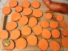 the carrots are cut up and ready to be cooked on the cutting board for cooking