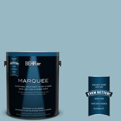 a blue paint with the words marquee on it and an empty can next to it