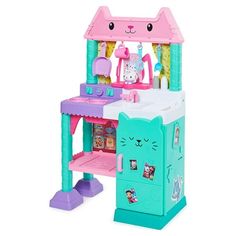 this is an image of a toy kitchen set with cat and kitten figures on it