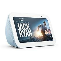 a white and blue alarm clock with the words jack ryan on it