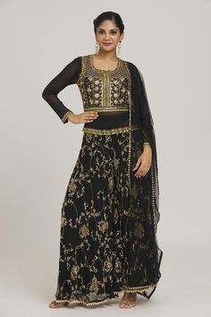 Black kurta with floral embroidery and tassels. Paired with flared pant and dupatta.
Components: 3
Pattern: Embroidered
Type Of Work: Floral
Neckline: Round
Sleeve Type: Full
Color: Black
Other Details: 
Curved hem
Tassels
Occasion: Mehendi and Haldi - Aza Fashions Embroidered Semi-stitched Sharara In Maxi Length, Embroidered Semi-stitched Sets Maxi Length, Bollywood Style Floral Embroidery Maxi Lehenga, Bollywood Style Maxi Lehenga With Floral Embroidery, Bollywood Style Floral Embroidered Maxi Lehenga, Festive Floor-length Sets With Floral Embroidery, Traditional Sets With Resham Embroidery Maxi Length, Anarkali Set With Floral Embroidery In Maxi Length, Diwali Maxi Length Sharara With Intricate Embroidery