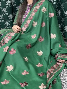 Green multicoloured kashmiri pashmina shawl is a statement piece with your winter outfits. Pure wool shawl. Embroidered kashmiri pashmina shawl. Beautiful winter accessory to pair with your statement dresses. Soft and warm beautiful winter shawl. Buy this for your self or give it to the ones you love ❤️  Length: 93 inches Width: 44.5 inches This item is dry clean only. Delivery 1-3 working days to UK 3-5 working days to Europe  And 6-7 working days to US and Other countries. Traditional Embroidered Green Shawl, Green Embroidered Shawl Dupatta, Embroidered Green Shawl Dupatta, Green Shawl With Resham Embroidery In Traditional Drape, Green Embroidered Dupatta Shawl, Festive Embroidered Pashmina Fabric With Dupatta, Semi-stitched Pashmina Embroidered Dupatta, Multicolor Embroidered Pashmina Shawl, Multicolor Pashmina Shawl With Chikankari Embroidery