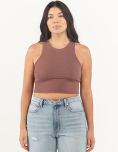 High Neck Tank. Solid Cotton Blend Tank Top With Stretch. Ribbed Knit Construction. High Neckline. Sleeveless. Fitted, Crop Silhouette. 57% Cotton/38% Polyester/5% Spandex. Hand Wash. Imported. Model Is Wearing A Size Large. Model Measurements:height: 5'7" Bust: 38"waist: 32"hips: 42" | Full Tilt High Neck Tank Ribbed Sleeveless Top With Medium Support, Brown Stretch Tank Top For Spring, Casual Brown Top With Seamless Construction, Stretch Sleeveless Halter Top With Seamless Construction, Brown Stretch Athleisure Top, Spring Stretch Brown Tank Top, Fitted Brown Athleisure Top, Spring Brown Stretch Tank Top, Sleeveless Ribbed Elastane Crop Top