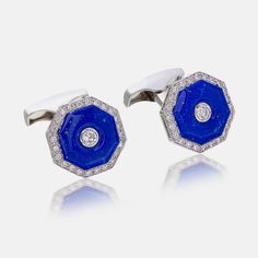 A pair of blue enamel diamond cufflinks made in 18 Karat white gold.

 	Blue enamel with a total weight of 3.99 carats
 	Fifty pieces of round diamonds totaling to 0.80 carats
 	Made in 18 Karat white gold. The pair of cufflinks weigh 10.60 grams

* Each piece is handmade. There may be a slight variation in the weights Luxury Blue Enamel Diamond Ring, Luxury Vintage Enamel Jewelry, Ceremonial Blue Enamel Jewelry, Diamond Cufflinks, Luxury Blue Elegant Cufflinks, Enamel Cufflinks, Blood Ruby, Diamond Cufflink, Burmese Ruby