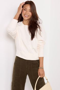 Designed with a seamed corset hem, this stylish EVEREVE sweatshirt is crafted in soft cotton knit fabric with a crew neckline and long sleeves. Add it to your everyday rotation with jeans or cargo pants. | EVEREVE Women's Baylor Corset Sweatshirt, Size XS, White Cotton Knit, Get Dressed, Crew Neckline, Cargo Pants, Sweater Top, Knit Fabric, Knitted Fabric, Long Sleeves, Top Outfits