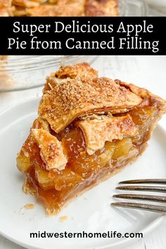 a slice of apple pie on a plate with a fork next to it and the words super delicious apple pie from canned filling