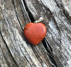 Check out our Natural Red Jasper Heart Pendant Necklace on Etsy. Silver-plated with Tombac, this unique gemstone necklace is a perfect way to show your style or give a beautiful gift. Share the beauty of nature with a necklace crafted with love." Origin: South Africa Size: 2x2cm Please kindly note that the photos are for illustration purposes only and the colours might slightly vary. IF YOU HAVE MORE QUESTIONS PLEASE MESSAGE US - WE ARE HERE TO HELP. If you are looking for another beautiful Hear Long Holiday, Necklace Craft, Necklace Gemstone, Gemstone Necklace Pendant, Unique Gemstones, Red Jasper, Beautiful Heart, Natural Red, Rocks And Minerals