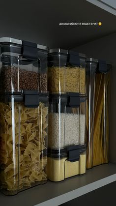 the shelves are filled with different types of pasta and other food in storage bins