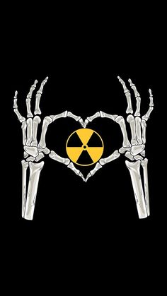 two hands holding up the shape of a heart with a radioactive sign on it's chest