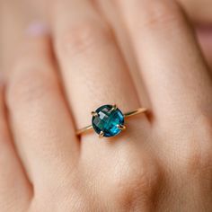 London Blue Topaz Ring 14K Gold - Prong Solitaire Natural Gemstone Ring for Women - Kyklos Jewelry ● Metal: 14K solid gold, 14K white gold or 14K rose gold ● Gemstone: London Blue Topaz, briolette cut ● Stone Diameter: 8 mm (0.3 in) ● Choose from the drop down menus the available options (Material, Ring size) and leave us a note for any special requirements. ● All our pieces are delivered beautifully packaged and gift ready, with a certificate of authenticity for the metal and the stone. Please Round Topaz Ring In 14k Gold, 14k Gold Sapphire-color Topaz Ring, 14k Gold Blue Topaz Ring, Blue Round Solitaire Emerald Ring, Blue Solitaire Emerald Ring, Round Shape, Blue Solitaire Emerald Ring Round Shape, Neelam Ring, London Blue Topaz Ring, Natural Gemstone Ring