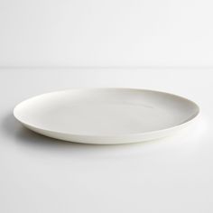 a white plate sitting on top of a table