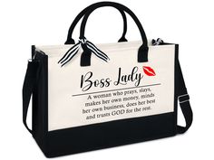 a black and white bag with the words boss lady on it