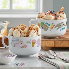 two bowls filled with ice cream on top of a counter