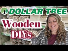 a woman standing in front of a wooden diy's display case with dollar tree