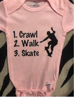 Item: Skateboard baby clothes/one piece/bodysuit WANT IT FASTER? CLICK HERE TO ADD RUSH FEE TO YOUR ORDER https://www.etsy.com/listing/276499336/rush-my-order-plus-upgrade-my-order-to?ref=shop_home_listings One piece bodysuit with snaps. Sizes available are: Newborn/0-3 months 6 months 9 months( white only) 12 months 18 months 24 months Bodysuit colors: Whiteblack lettering Light Pinkblack lettering Light Blueblack lettering grayblack lettering redwhite lettering greenwhite lettering blackwhite Casual Pink Onesie With Letter Print, Casual Pink Unisex Onesie, Casual Graphic Print Onesie For Playtime, Customizable Casual Short Sleeve Onesie, Customizable Short Sleeve Casual Onesie, Casual Onesie With Name Print For Playtime, Casual Onesie With Graphic Print, Gender-neutral, Unisex Casual Onesie With Graphic Print, Casual Graphic Print Bodysuit For Playtime