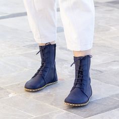 🌌 Crazy Navy Blue Earthing Leather Boots | Nefes Shoes - A Step into Serenity 🌌 Immerse Yourself in a World of Comfort and Connection Introducing the Nefes Crazy Navy Blue Earthing Leather Boots - where timeless elegance meets the grounding essence of nature. These boots are more than a fashion statement; they are an embodiment of a lifestyle in harmony with the earth. 👣 Barefoot Women Boot: Experience Unmatched Freedom Crafted with the ethos of barefoot walking, our boots offer an experience Blue Leather Boots With Vibram Sole, Blue Leather Lace-up Boots, Blue Round Toe Boots With Vibram Sole, Blue Leather Shoes With Flat Heel, Blue Ankle-high Boots With Rubber Sole, Blue Closed Toe Boots With Rubber Sole, Blue Leather Shoes With Rubber Sole, Blue Boots With Rubber Sole, Blue Leather Ankle Lace-up Boots