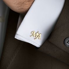 Introducing our 🎁Personalized Name Cufflinks💖, exquisitely crafted with unmatched precision and care.  😍 Customizable: Perfectly tailored to match your elegance, these cufflinks can be personalized with any initial, rendering them the most intimate piece in your accessory collection.  💫High Quality: These sterling silver cufflinks are fashioned out of the finest silver, ensuring longevity and a high-quality finish.  👔Sophisticated design: The simple yet chic design of these cufflinks make them an irresistible choice for any formal event - be it a wedding, a meeting, or just another day at the office.  🎁Perfect gift: Searching for a unique gift for an special man in your life? Your pursuit ends here! These silver cufflinks make a perfect choice for birthdays, anniversaries, and Christ Personalized Silver Lapel Pin As Gift, Personalized Silver Lapel Pin Gift, Personalized Silver Lapel Pin For Gift, Classic Gold Lapel Pin For Wedding, Luxury Silver Lapel Pin As Gift, Luxury Cufflinks For Business And Father's Day, Formal Initials Cuff Jewelry, Classic Personalized Jewelry For Business, Luxury Engraved Cufflinks For Gift