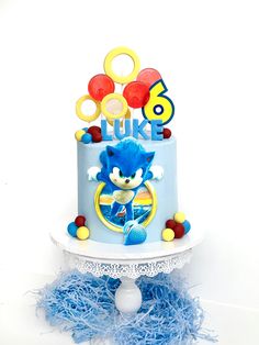 a birthday cake with an image of sonic the hedgehog on it