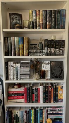 a book shelf filled with lots of books