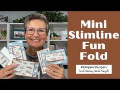 a woman holding up some cards with the words mini slimline fun fold