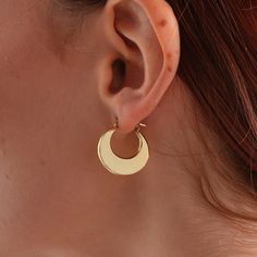 14 Carat Gold Crescent Model Earrings 14 Carat (585) Gold Weight: 2,25 gr. Color: Yellow. The size of the earring is average 2 cm. A great piece to add to every outfit! chains that you can combine with your clothes with the elegance of İpek Silver! * Product Detail Product Content: 14k Gold All our products are sent with İPEK SİLVER Guarantee. Since our products are handcrafted, there may be + - 5% deviation in mine weights. The product are sent with a gift box, package and a gift note of your choice. Your products are sent with the gift box, package and note of your, with the İpek Silver guarantee. *I will put your jewelry in a nice and secure package in order to make sure that it will be delivered to your address safely. This is definitely the perfect gift for him or her. *JEWELERY GIFTS Elegant Huggie Earrings With Moon Charm, Minimalist Crescent Hoop Earrings, Minimalist Moon-shaped Pierced Hoop Earrings, Modern Crescent Moon Charm Jewelry, Gold Crescent Hoop Earrings With Moon Phase, Minimalist Crescent Hoop Earrings With Ear Wire, Minimalist Crescent Hoop Earrings With Moon Charm, Crescent Hoop Earrings With Ear Wire, Moon Charm Huggie Earrings