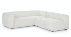 the corner sofa is made from white fabric