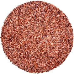 an orange colored round rug on a white background with room for text or image photo