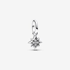 Bring a dash of cosmic energy to your look with the Pandora ME Star Mini Dangle Charm. This sterling silver eight-pointed star features five sparkling stones and microbeads on one side, with a microbead pattern on the reverse side. As a symbol of renewal, dreams and a guiding light, this star can take on any meaning you or a loved one gives it. Can only be styled on openable links. Pandora Me Charms, Silver Star Charm With Celestial Style, Silver Star Charm Celestial Charms, Silver Star Charm Celestial, Silver Celestial Star Charm, Elegant Silver Star Charm, Celestial Style Silver Jewelry With Sparkling Stones, Celestial Silver Jewelry With Sparkling Stones, Sterling Silver Star-shaped Charms