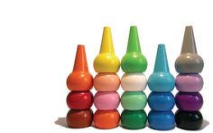 a group of colorful wooden toys sitting on top of each other