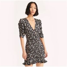 This Veronica Beard Dress Is Presented In A Romantic Floral Print With Ruched Pleating Throughout. Lightweight Stretch Crepe V Neck And Elbow-Length Sleeves Ruched Elastic Trim Ruffle Hem Floral Print Hidden Zip At Side Shell: 91% Silk, 9% Elastane Lining: 100% Polyester Dry Clean Made In China Ruched Knee-length Dress For Brunch, Spring Dresses With Ruched Sides And Short Sleeves, Spring V-neck Mini Dress With Ruched Sides, Fitted V-neck Mini Dress With Smocked Back, Fitted Floral Print V-neck Dress With Surplice Neckline, Floral Print Non-stretch Mini Dress With Short Sleeves, Linen Sheath Dress, Fitted Floral Print V-neck Maternity Dress, Blue Floral Print Dress