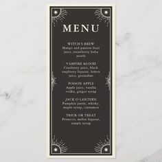 a black and white menu card with an art deco design