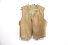 Vintage 1960s 70s leather vest Made by Frostline Kit Size Large listed, but fits more like a Medium Across chest - 20 inches Length - 23 inches Leather vest ez5 Classic Brown Leather Vest, Mens Western Leather Vest, Fitted Vintage Leather Vest, Vintage Brown Vest With Button Closure, Cowboy Vest, Vintage Western Leather Vest, Brown Fits, Easy Rider, Mens Vests