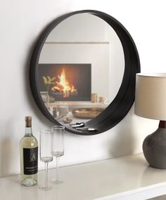 Create a beautiful, modern wall display in any room of your home with this beautiful Wheeler wall mirror from Kate and Laurel. This mirror offers your home a trendy, round shape, with a graduated profile depth that offers a chic catch-all for small items. Use this lower shelf as an area to store keys, small plants, jewelry, and more! The sleek, modern black finish and round shape create a sophisticated wall décor item that catches the eye without overshadowing your other décor pieces. If you hav Centsational Style, Wall Mirror With Shelf, Framed Wall Mirror, Mirror With Shelf, Mdf Frame, Round Wall Mirror, Framed Mirror Wall, Round Mirror, Mirrors Wayfair