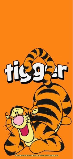 an orange tiger laying down with the word tigger on it's face and mouth