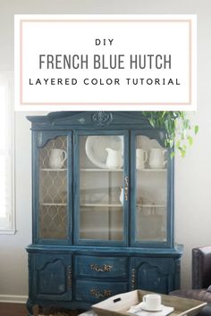 the french blue hutch has been painted and is ready to be used as a dining room