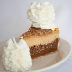 a piece of pie with whipped cream on top