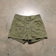 Vintage 70s olive green athletic/hiking shorts. Good vintage condition. Please see full measurements below.  Waist: 31" Inseam: 3" Outseam: 14" If you would like to see additional photos or have any other questions, please do not hesitate to ask, and thanks for looking! Shipping disclaimer: All domestic orders under 16oz ship USPS Ground Advantage. All domestic orders over 16oz ship USPS priority mail. All international orders under 4lbs ship via Etsy's Global Shipping Program. All international orders over 4lbs ship USPS priority mail. If international buyers wish to have a package that is under 4lbs shipped via priority mail, please contact me before purchasing so that I can adjust the shipping charges. Insurance can be added to any domestic or international order, please contact me befo Vintage Cargo Shorts, Olive Green Shorts, Hiking Shorts, Shorts Cargo, Green Shorts, Vintage 70s, Cargo Shorts, Priority Mail, Short Outfits