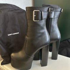 Truly Stunning Saint Laurent Platform Boots. Hit Mid-Calf With A 5.75” Stacked High Heel, 2.5” Wrapped Platform - Feels Like A 3.25” Heel. They’re Surprisingly Comfortable Thanks To The Stability Offered By How High It Goes. These Are Brand New, Never Worn And Come With The Saint Laurent Dust Bags (2). Fit True To Size. Size 36.5. Luxury High Heel Calf Leather Platform Boots, Luxury High Heel Boots With 4-inch Heel, Luxury High Heeled Boots With 4-inch Heel, Luxury Platform Boots With Sculpted Heel, Luxury Boots With 4-inch Heel For Night Out, Luxury High Heel Boots With Reinforced Heel, Luxury Fitted High Heel Platform Boots, Calf Leather Round Toe Heels For Party, Luxury Platform Boots With Round Toe