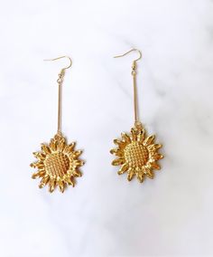 Sunflower inspired dangle earrings Flower: sunflower 🌻  Colour: gold Metal: gold plated Style: dangle Gold Dangle Earrings For Summer, Summer Metal Dangle Flower Earrings, Summer Dangle Flower Earrings, Gold Flower Charm Earrings For Summer, Yellow Gold Drop Earrings For Summer, Gold Flower-shaped Earrings With Flower Charm, Gold Flower Earrings With Charm, Sunflower Design Dangle Earrings As Gift, Nickel-free Gold Flower Earrings