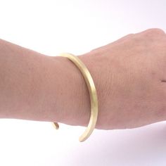 These Great Eye-Catchers are made of simple brass or Sterling silver and ideal for men and women. Here's what Our Customers have to say: "Beautiful bracelet very consistent with their photo and description! Thank you :)" "Fantastic cuff! I have ordered from VirginiaWynne more than any other shop. I end up wearing her classic pieces almost every day!" Perfectly capable of riding solo or a great piece to pile on with your other favorites. Made of 8 gauge solid square brass or sterling silver wire Classic Brass Bangle Bracelets, Classic Gold Bracelet Bangle In Brass, Classic Gold Brass Bangle Bracelet, Classic Adjustable Gold Brass Bracelet, Classic Brass Bangle Cuff Bracelet, Brass Bangle Bracelet For Everyday Wear, Everyday Brass Bangle Cuff Bracelet, Modern Brass Bangle For Everyday Wear, Handmade Minimalist Brass Bracelets